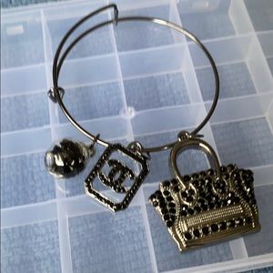 Black bangle with charms